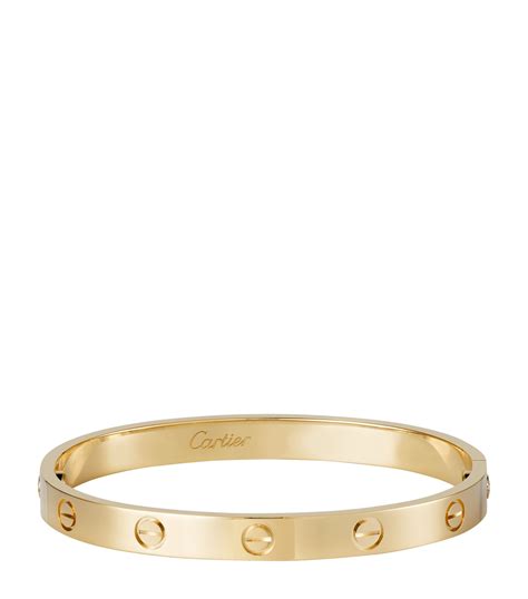 cartier love yellow gold bracelet|cartier gold bracelet with screws.